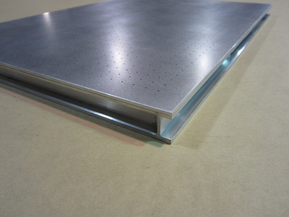 Vacuum table flange allows for simple clamping