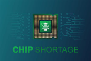 Green and gold semiconductor and computer micro chip supply chain shortage.