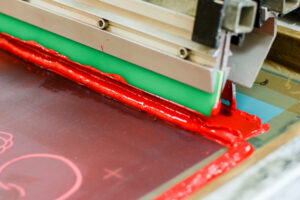 screen printing ink applied to squeegee